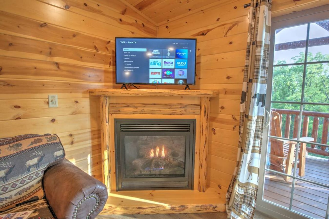 Gas fireplace and Roku smart TV in the Aspen Suite living room