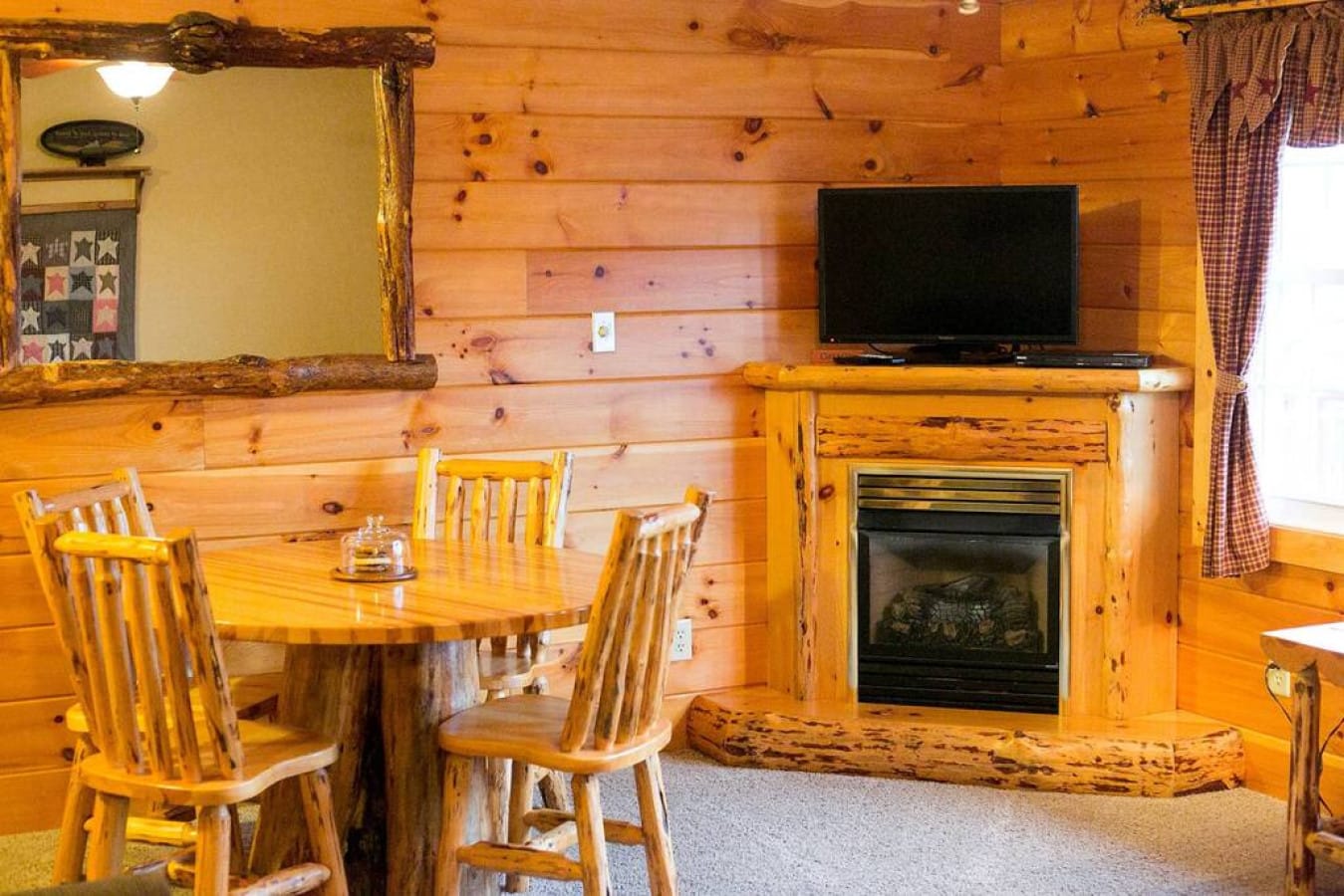 Living room and fireplace in the Grace Suite