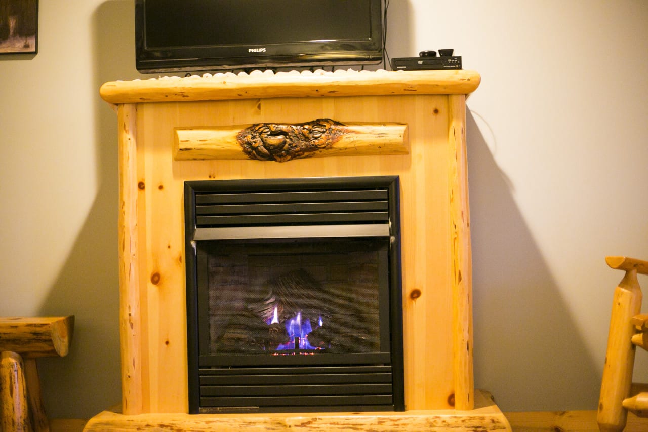 Indoor fireplace in the Serenity Suite